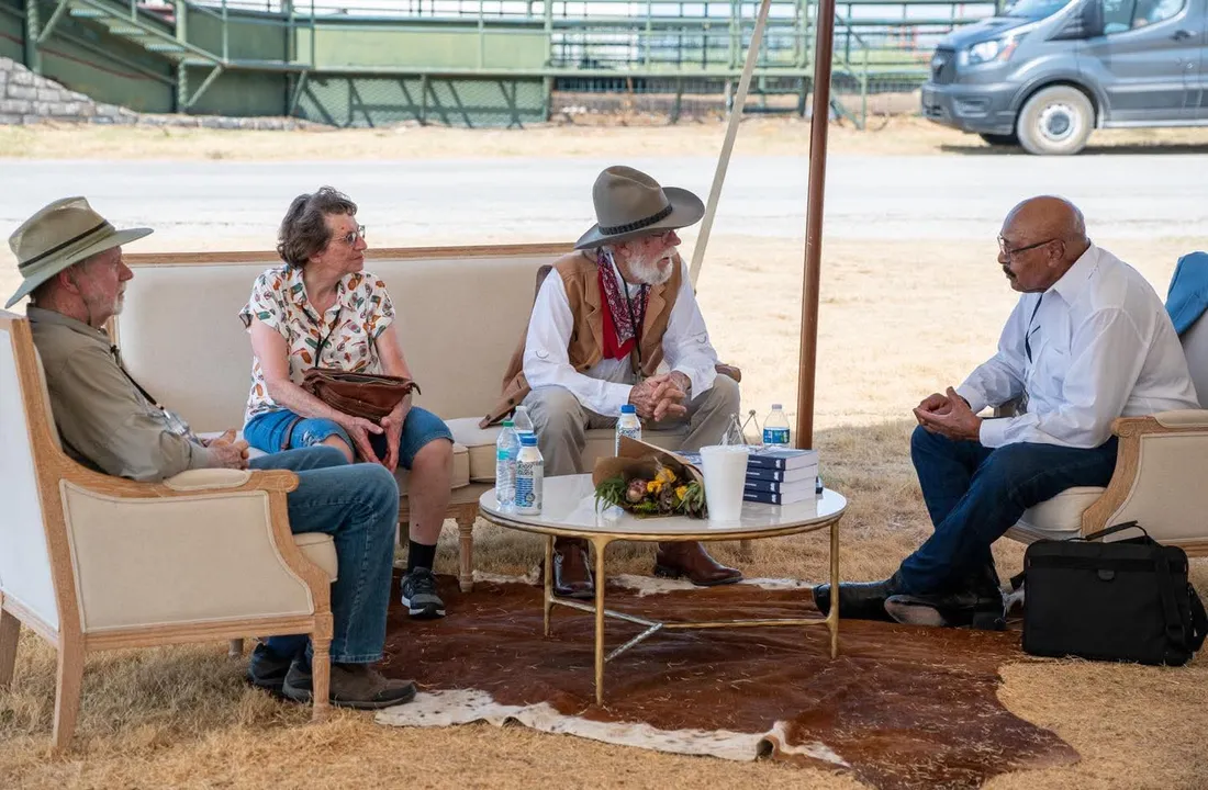 Conversational circle under the TCU Press tent at Bosque Ranch Live 2026